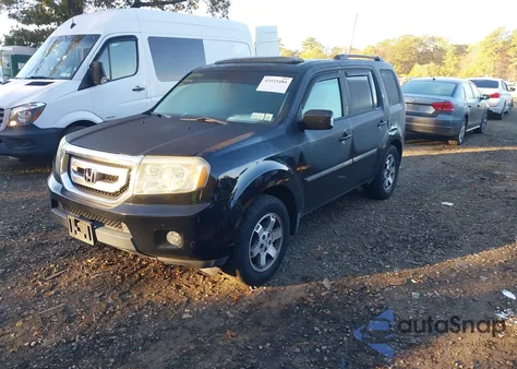 2009 Honda Pilot Touring z USA, uszkodzony, nr VIN 5FNYF48949B014963